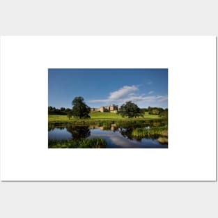 Alnwick Castle reflected in the River Aln. Posters and Art